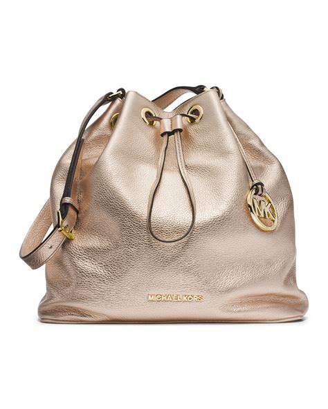 michael kors gold drawstring handbag|Michael Kors drawstring front grommets.